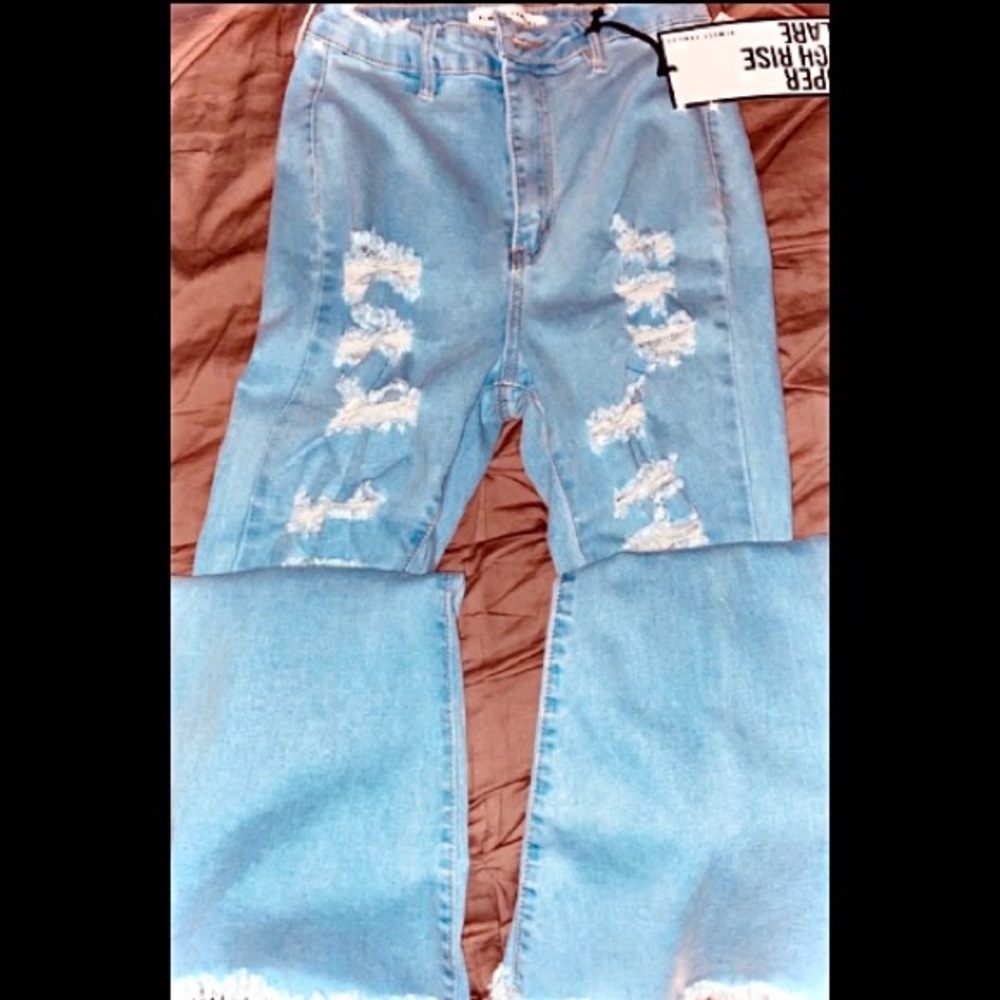 Ripped Bell Bottom Jeans